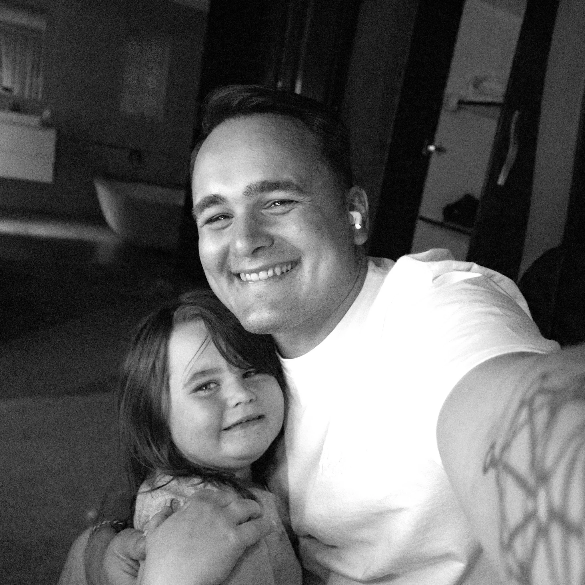 Devin with daughter, black and white